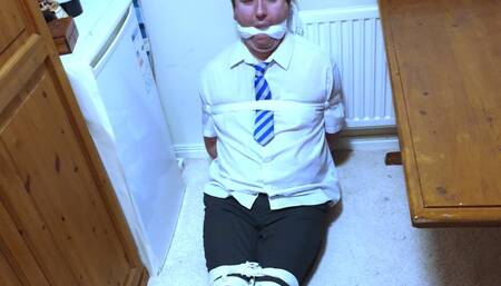 Tightly bound and gagged man in adult school uniform made to hop to room