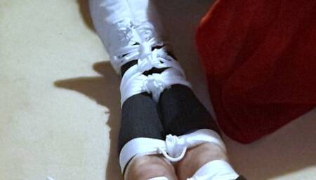 Tightly bound and gagged man in adult school uniform made to crawl to bed