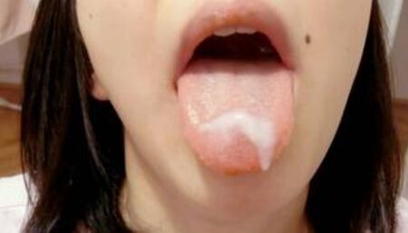 Cute Asian girl chokes on cum after a blowjob with a huge cumshot