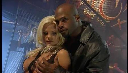 Blonde in Black Latex Is Fucked by on Sacrificial Altar by Dyke with Strap-on