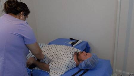 Doctor Jess performs facesitting, teasing, and ball slapping on patient