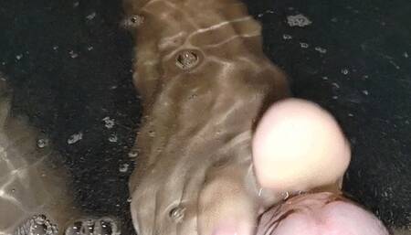 improvised footjob in jacuzzi