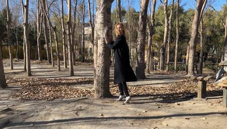 girl in mules walks in the park through the mountains and constantly loses her shoes, staining her white tights with dirt