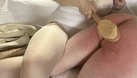 The bath brush and the boob rub