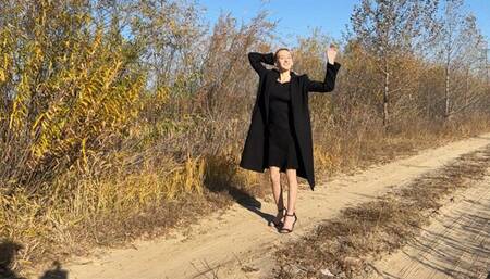 girl began to crush the can with her heels and did not notice how glue flowed out of it, which made her feet stick to the road