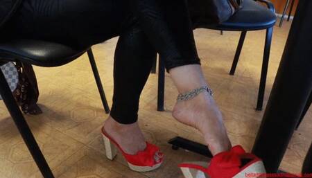 Shoeplay mules, soft skin under the meeting table