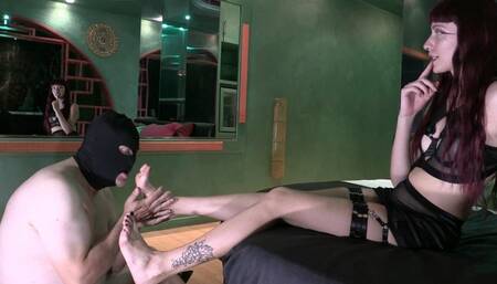My slave tastes my heels and feet