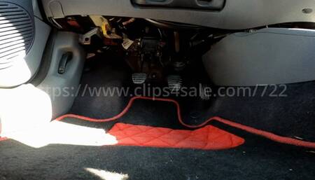 Laetitia revs and drives the Clio with red pumps and nylon - feet pov