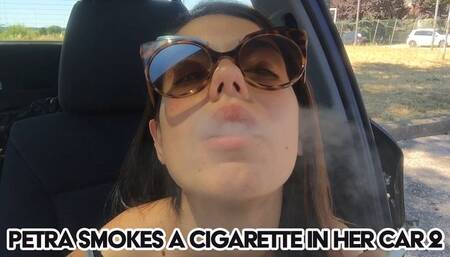 Petra smokes a cigarette in her car 2 - FULL HD