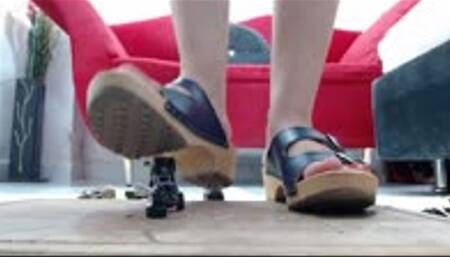 crushing metal military cars in wooden red heels and swedish Bresco sandals P1