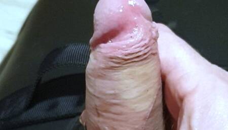 Edging a helpess man in a neoprene sleepsack