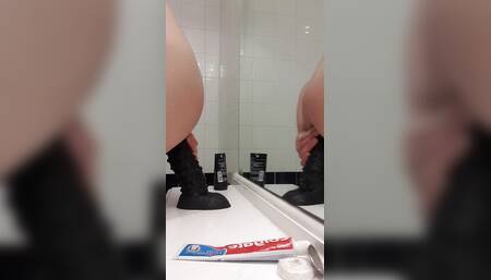 Carl Cagedwarrior Takes Huge BBC Dildo in Hotel Bathroom with Mirror Reflection