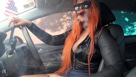Cigar in my car with all the windows closed - leather jacket, red lips