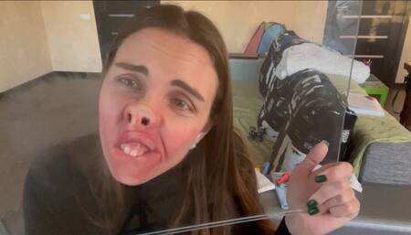 Face smeared against the glass