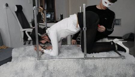 XY Bondage 127-Black stocking OL is restrained by the iron frame and vibrates to climax