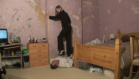 Danielle Walking On Her Slaves Body In A Pin Stripe Suit