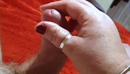 Ballbusting and handjob on man tied to bed