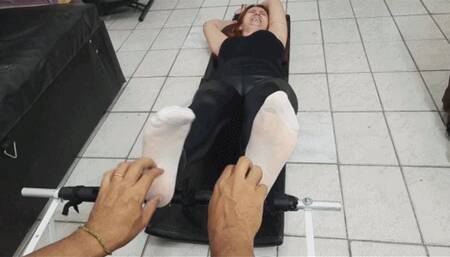 Amanda tickled by 2 ticklers at the same time