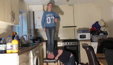 Head Trampled Under Bare Feet On The Chair (4K)