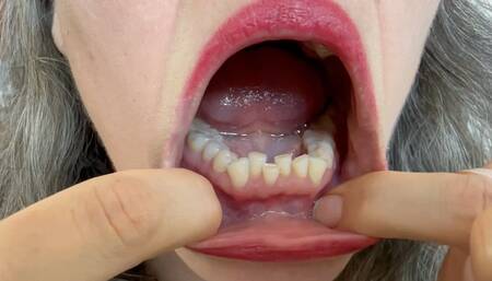 let's have a look at her wet mouth