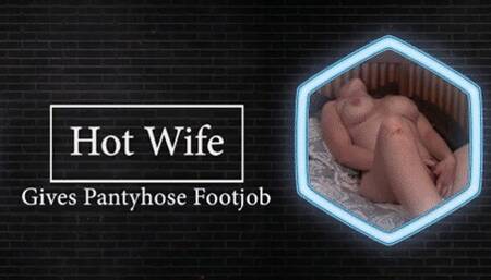 Hotwife gives a Pantyhose Footjob