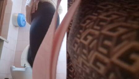 Peeing in a cold bathroom in a bar in Milan