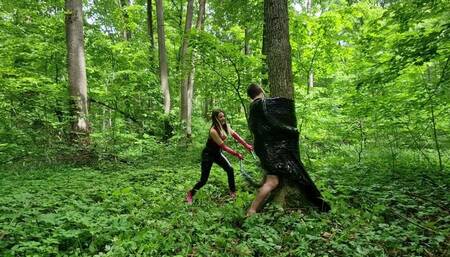 NoirQueenie and Faith - forest adventures part 7 - Mummification and whipping in the forest