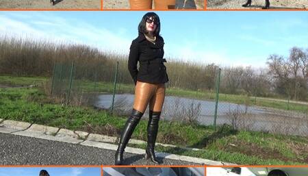 Handcuffed wife in coat, leather leggings and over knee boots