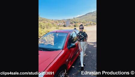 101 B - Katya driving Pegeot 206 in sneakers