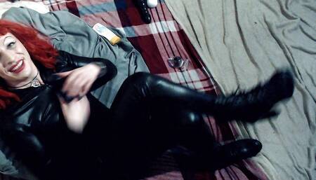 Red Haired Shemale Wearing a Shiny Latex Fetish Catsuit Anal Plugging Herself on Her Bed