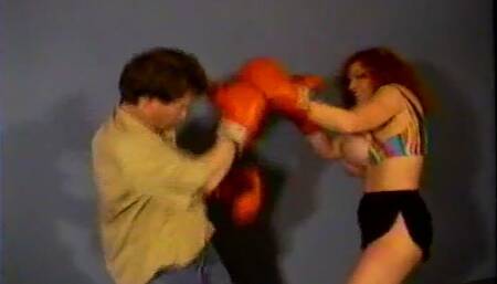 Big Tit Star Teddi Barrett Boxes Male Into Submission Then Breast Smothers Him