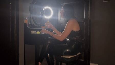 Smoking at my dressing table in latex pants and bodysuit