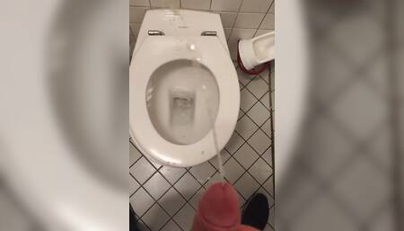 Pissing in Public Bathroom