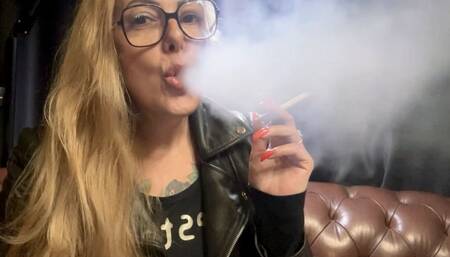 Marlboro reds - Audible inspirations - Long drag - Deep Inhales - Mouth Inhales and open mouth exhales - Coughing - Triple pumps - Smoke rings - Genuine leather jacket - Long hair - Long red nails - No makeup