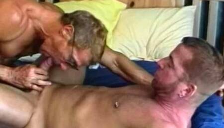 Muscle Bound Guys on the Bed