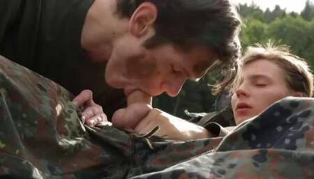 Army twinks sucking cock on top of a tank