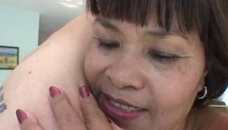 Older Asian Lady Jumps Salesman