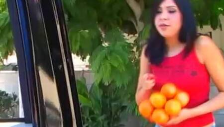 Cute Latina Selling Oranges