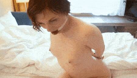 Kitty Quinzell completely naked enjoys herself ballgagged and drooling and wraparound tape tied mobile version 720p