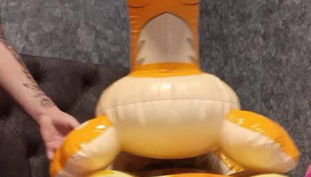 riding an infatable deer