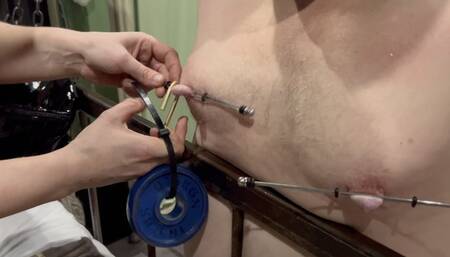 extreme nipple play with 2 waights of almost 1 kg for this bdsm slave