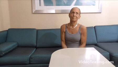 Randi distracts with her Biceps then beats Wimpy in Arm Wrestling