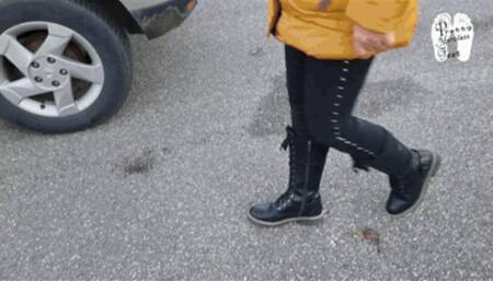 Driving her Car with winter Boots