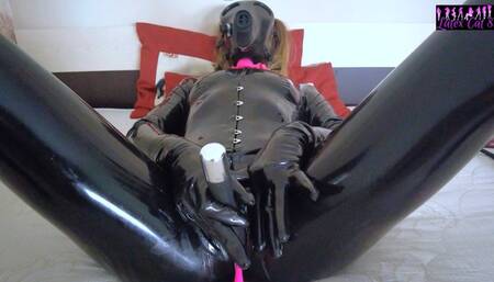Rubber doll plays with pussy