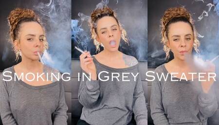 Smoking in Grey Sweater