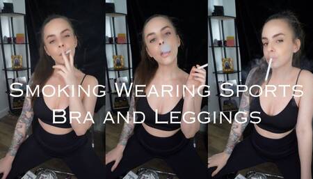 Smoking Wearing Sports Bra and Leggings