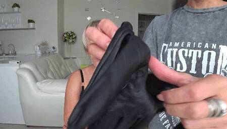 Hands in leather gloves around the blondes mouth and on her neck LG