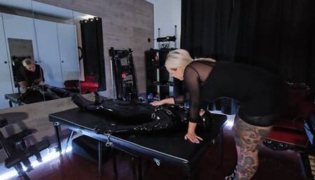 Mistress facesitting and smothering her latex gimp