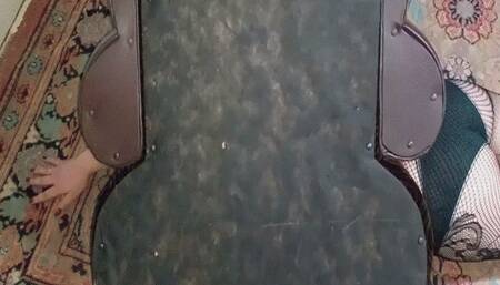 Girl stuck under a chair MP4