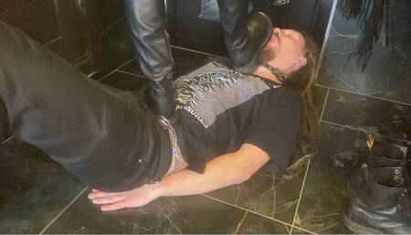 Licking two pairs of shoes, spits from the soles and trampling